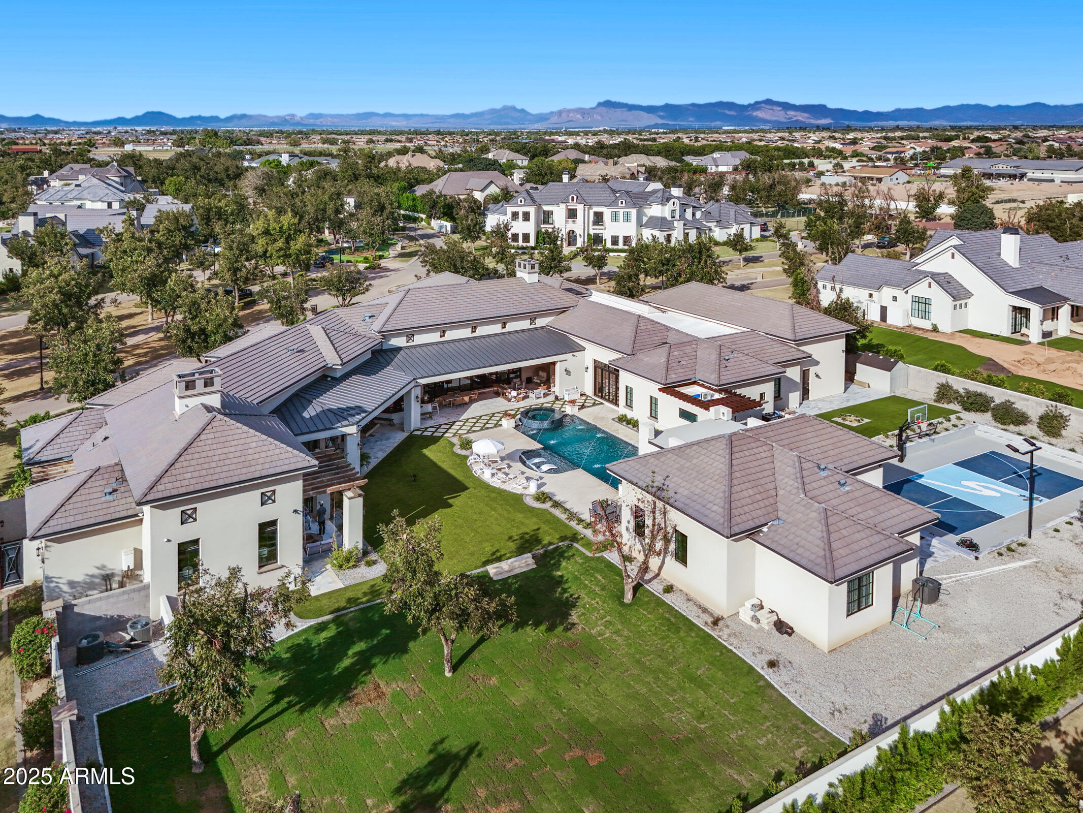 20623 East Cloud Road Queen Creek, AZ 85142 - Photo 96 of 115 an aerial view of residential houses with outdoor space and ocean view