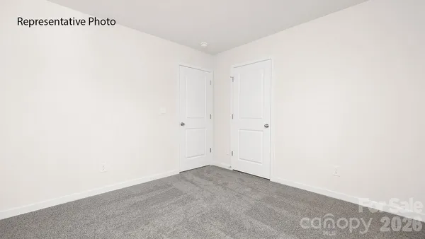 a white toilet sitting next to a bath tub