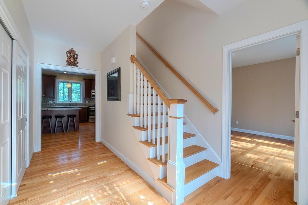 16 Mockingbird Hill Road Groton, MA 01450 - Photo 4 of 41 a view of entryway and hall with wooden floor