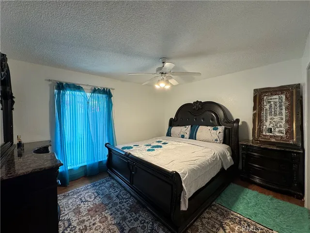 a bedroom with a bed and a closet