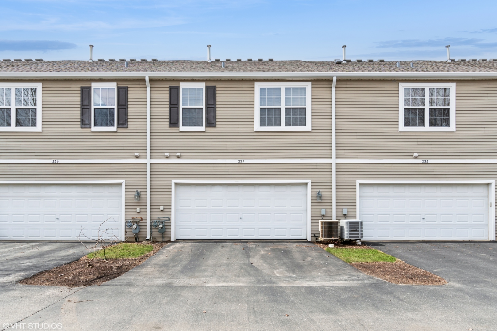 237 Springbrook Trail South, Unit 3 Oswego, IL 60543 - Photo 16 of 17 a front view of a house