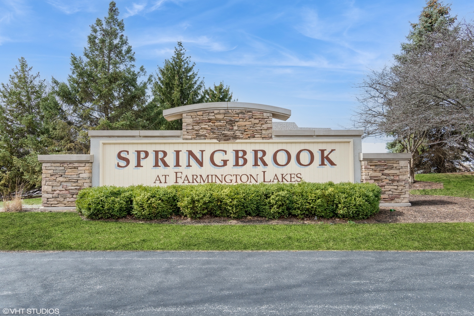 237 Springbrook Trail South, Unit 3 Oswego, IL 60543 - Photo 17 of 17 a sign on the side of a building