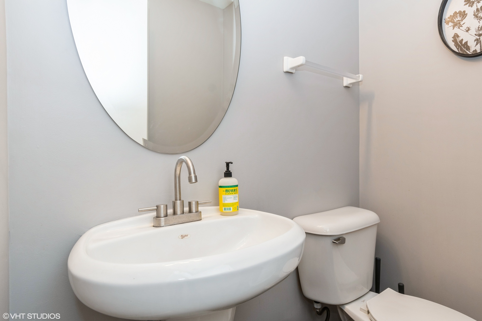 237 Springbrook Trail South, Unit 3 Oswego, IL 60543 - Photo 8 of 17 a bathroom with a sink and a mirror