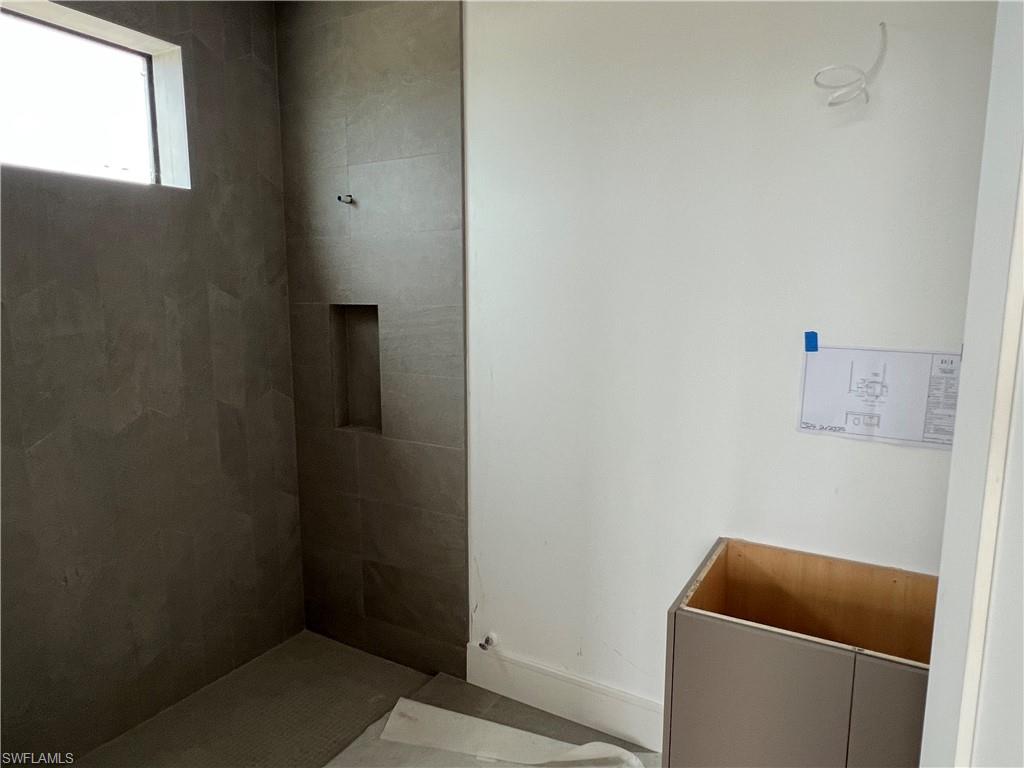 944 Chimney Rock Road Naples, FL 34120 - Photo 8 of 20 a room with storage and utility
