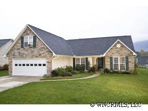 231 Farm Valley Road Fletcher, NC 28732 - Photo 1 of 12 a front view of a house with a yard