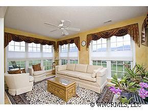 231 Farm Valley Road Fletcher, NC 28732 - Photo 5 of 12 a living room with furniture and a large window