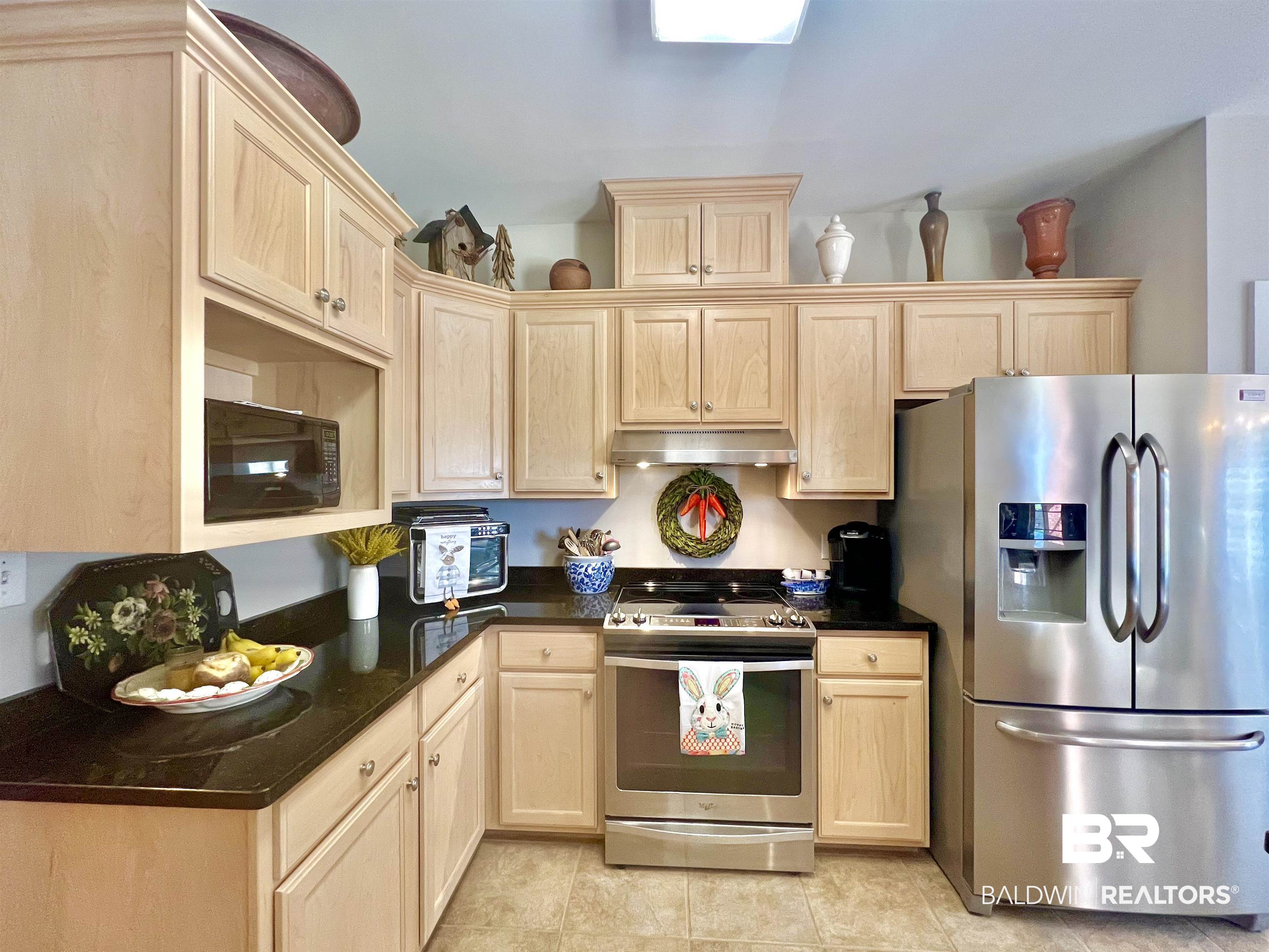 23491 Cornerstone Drive Loxley, AL 36551 - Photo 9 of 38 Beautiful cabinet and granite countertops