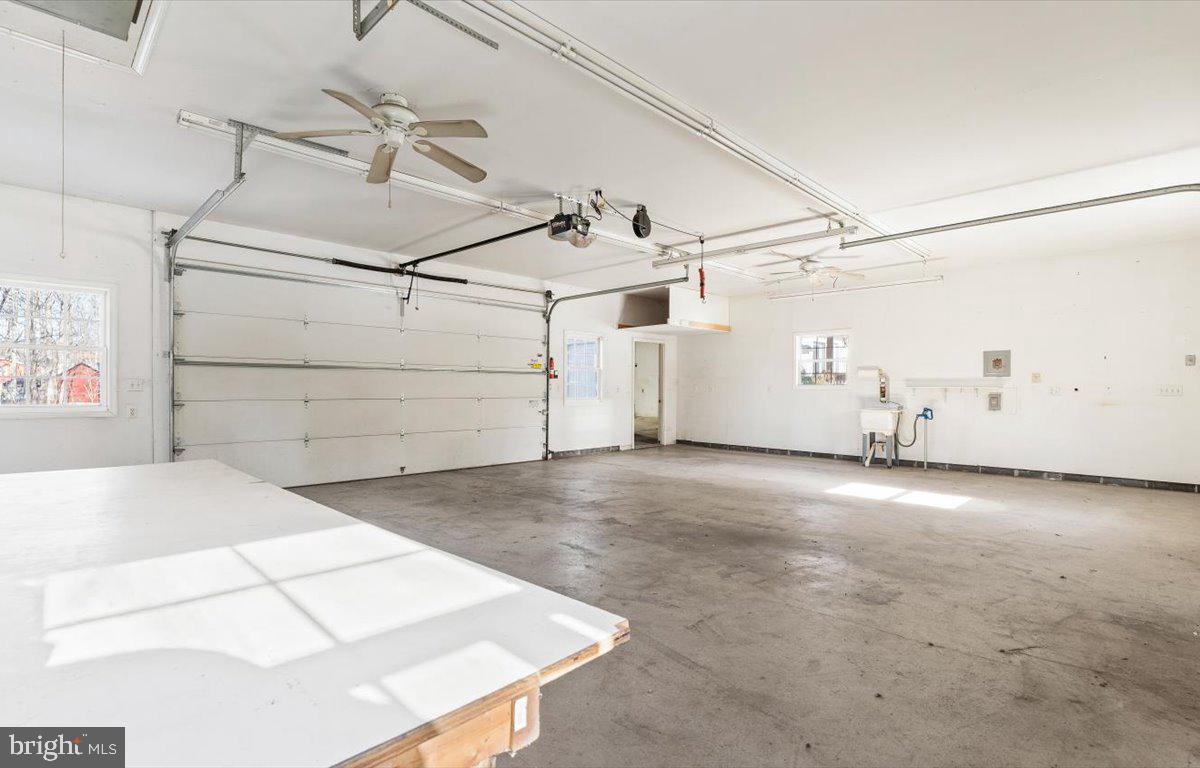 12620 Kahns Road Manassas, VA 20112 - Photo 60 of 68 Garage with room for 3 cars with front and rear ex