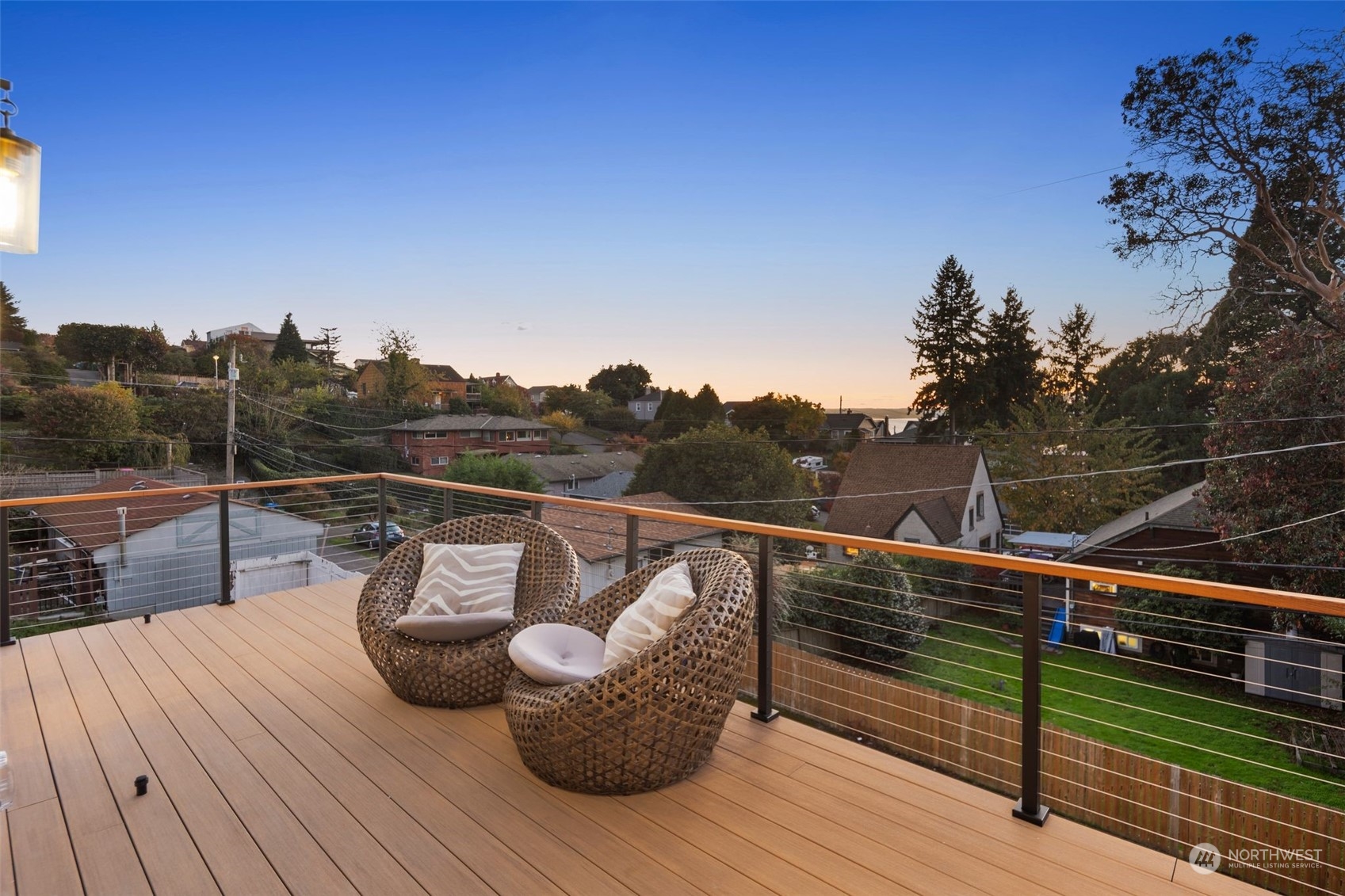 6601 39th Avenue Southwest Seattle, WA 98136 - Photo 20 of 40 a view of a roof deck with wooden floor and city view