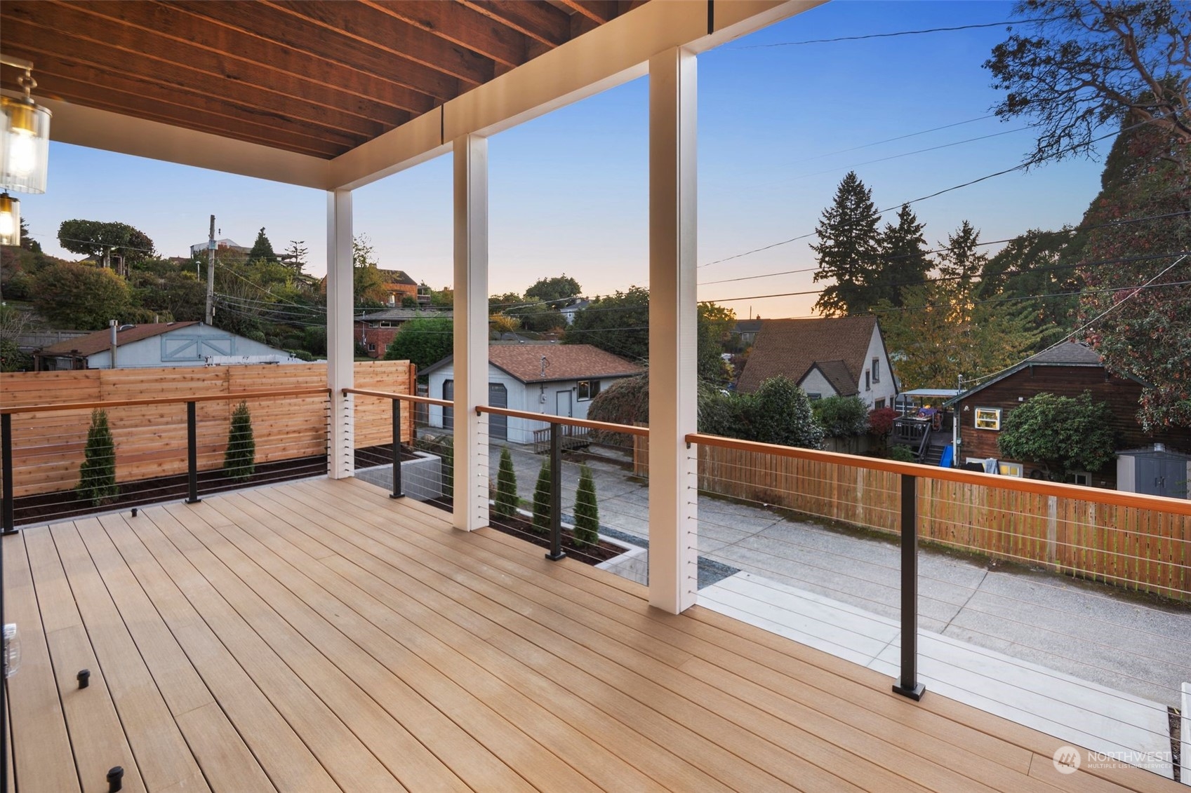 6601 39th Avenue Southwest Seattle, WA 98136 - Photo 21 of 40 a view of balcony with a large window and wooden floor