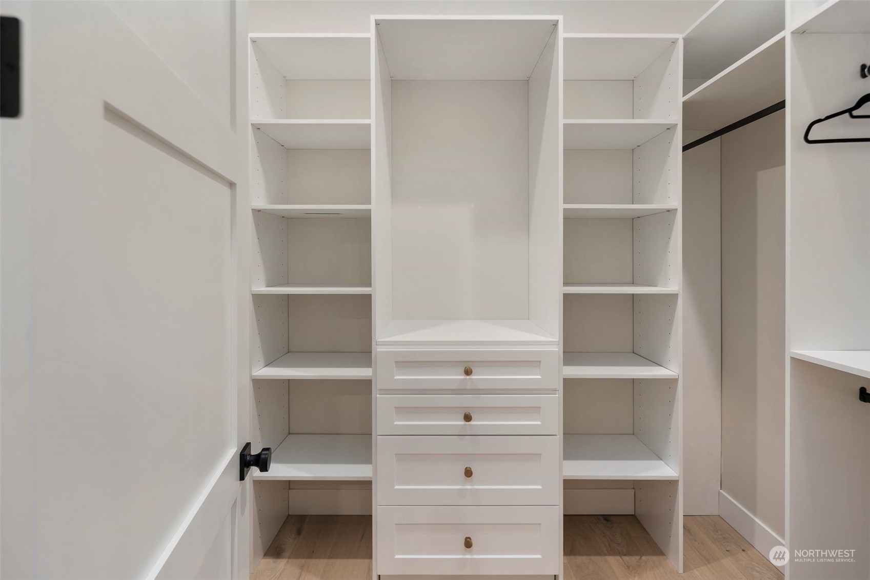 6601 39th Avenue Southwest Seattle, WA 98136 - Photo 25 of 40 a view of walk in closet with empty racks