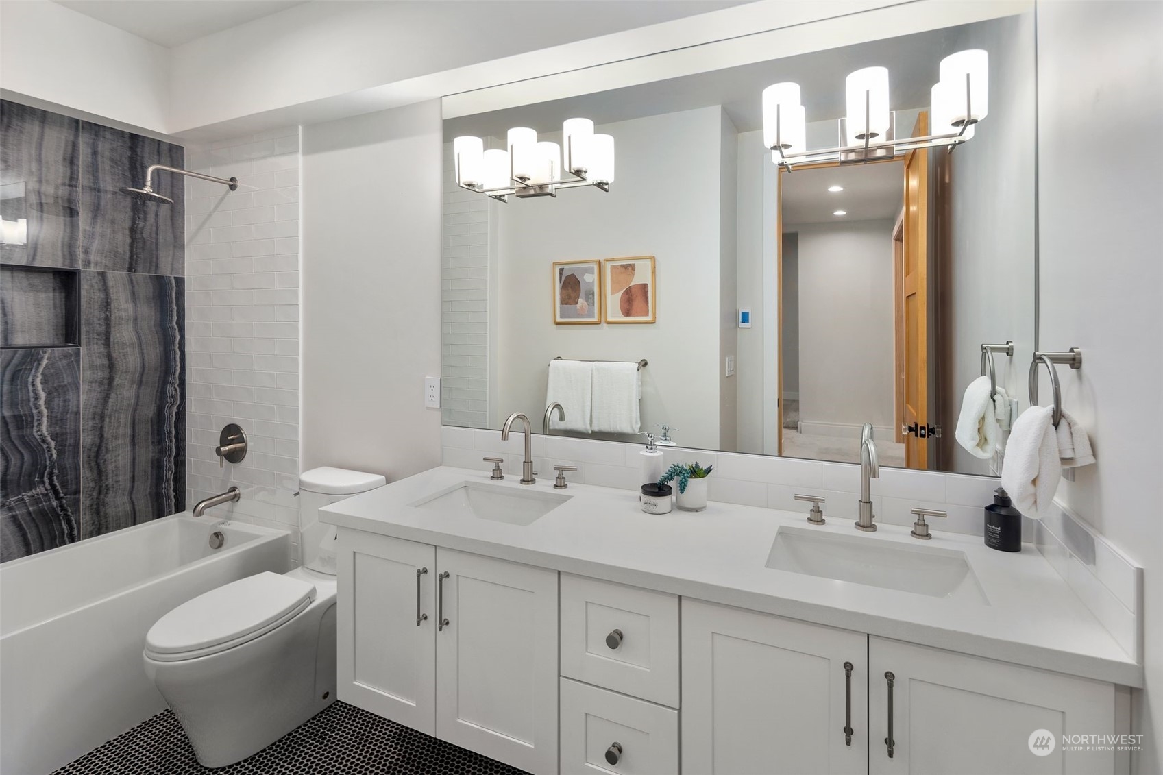 6601 39th Avenue Southwest Seattle, WA 98136 - Photo 29 of 40 a bathroom with a double vanity sink mirror and toilet