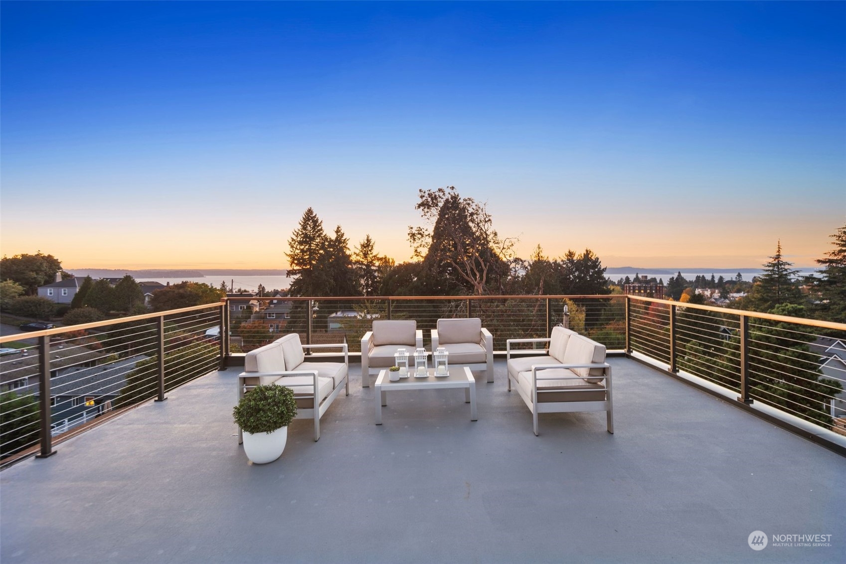 6601 39th Avenue Southwest Seattle, WA 98136 - Photo 38 of 40 a terrace view with outdoor seating and city view