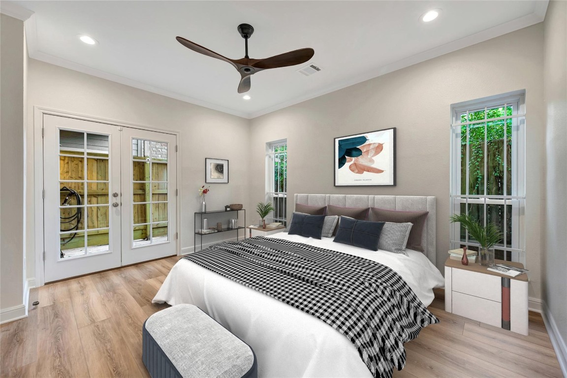 2001 Bering Drive, Unit 7L Houston, TX 77057 - Photo 15 of 33 a bedroom with bed and a large window