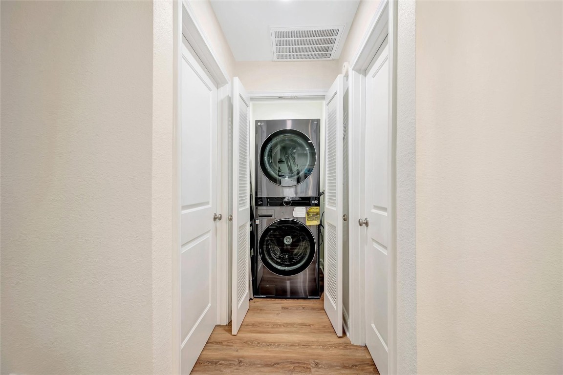 2001 Bering Drive, Unit 7L Houston, TX 77057 - Photo 21 of 33 a view of entryway with washer and dryer