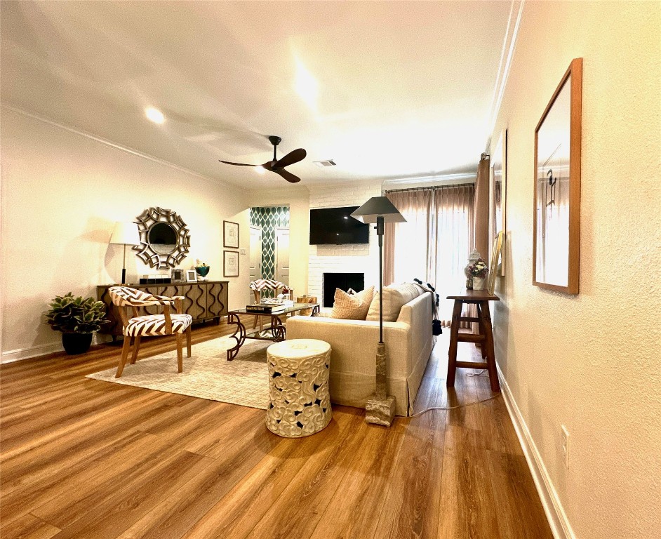 2001 Bering Drive, Unit 7L Houston, TX 77057 - Photo 5 of 33 a living room with furniture and a fireplace