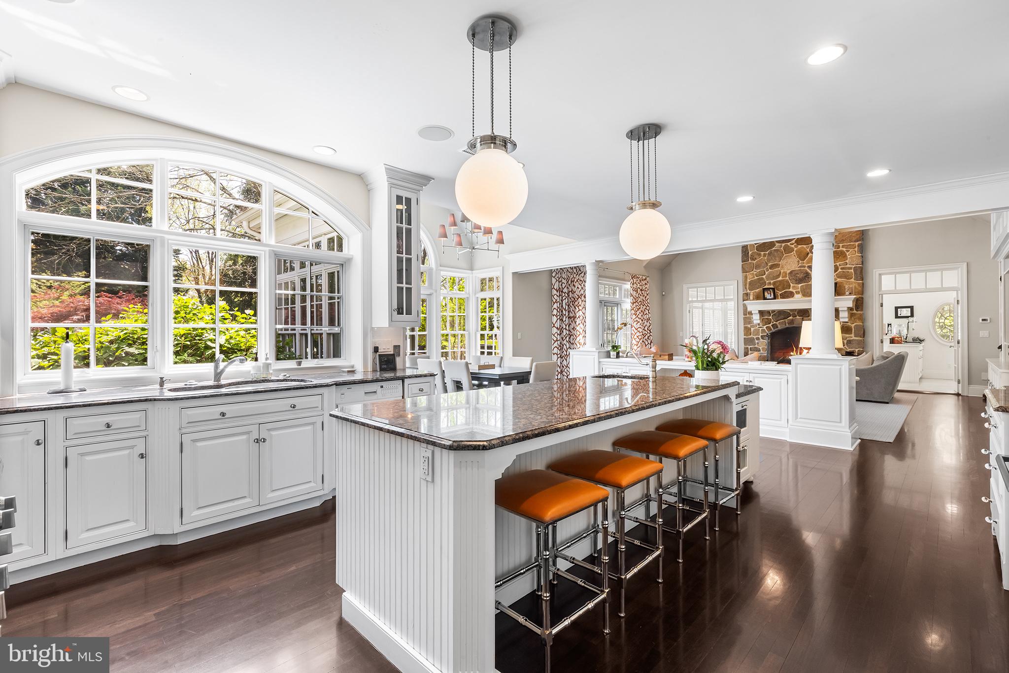 1278 Farm Road Berwyn, PA 19312 - Photo 12 of 65 a large kitchen with granite countertop a large island in the center