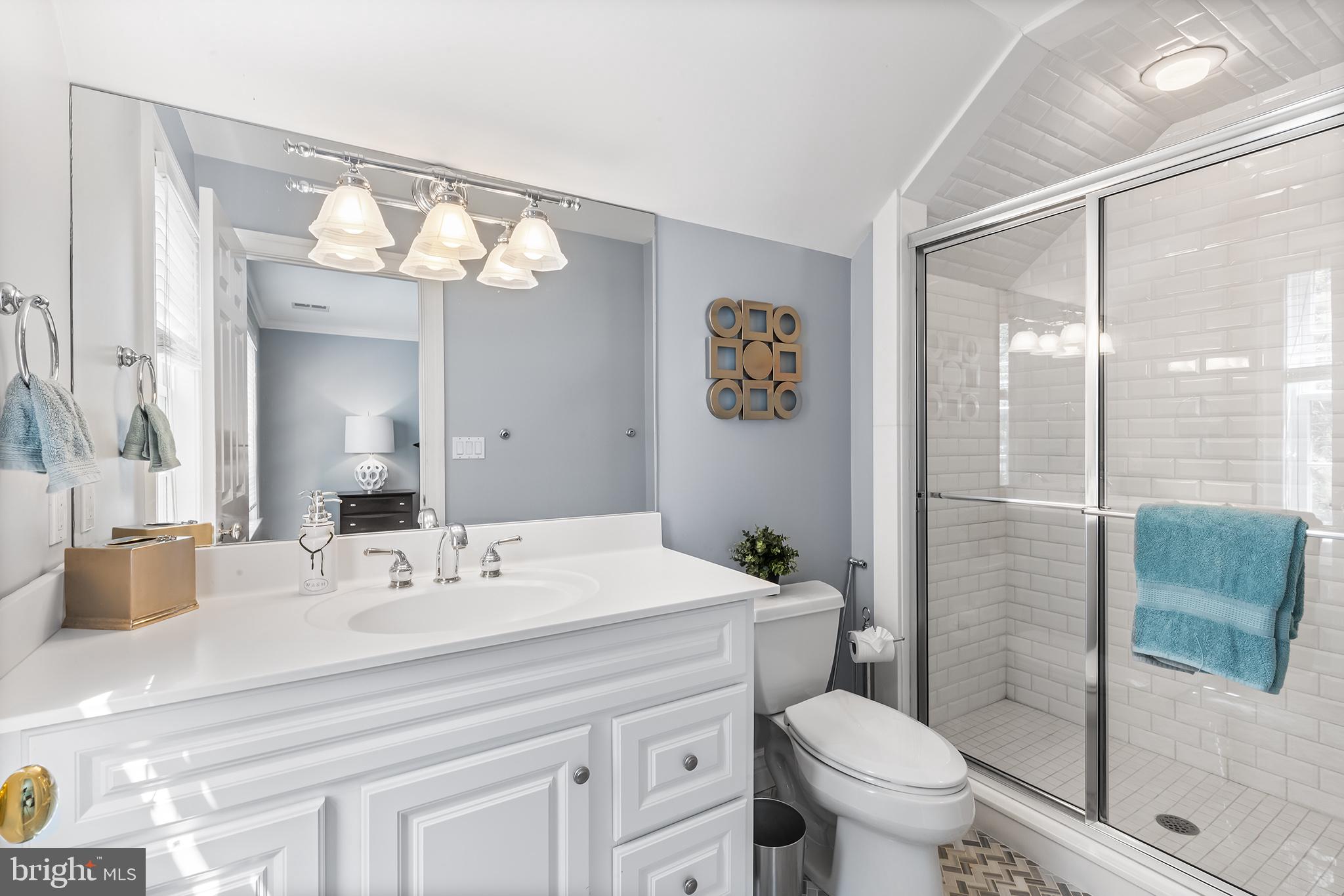 1278 Farm Road Berwyn, PA 19312 - Photo 40 of 65 a bathroom with a sink a toilet and shower