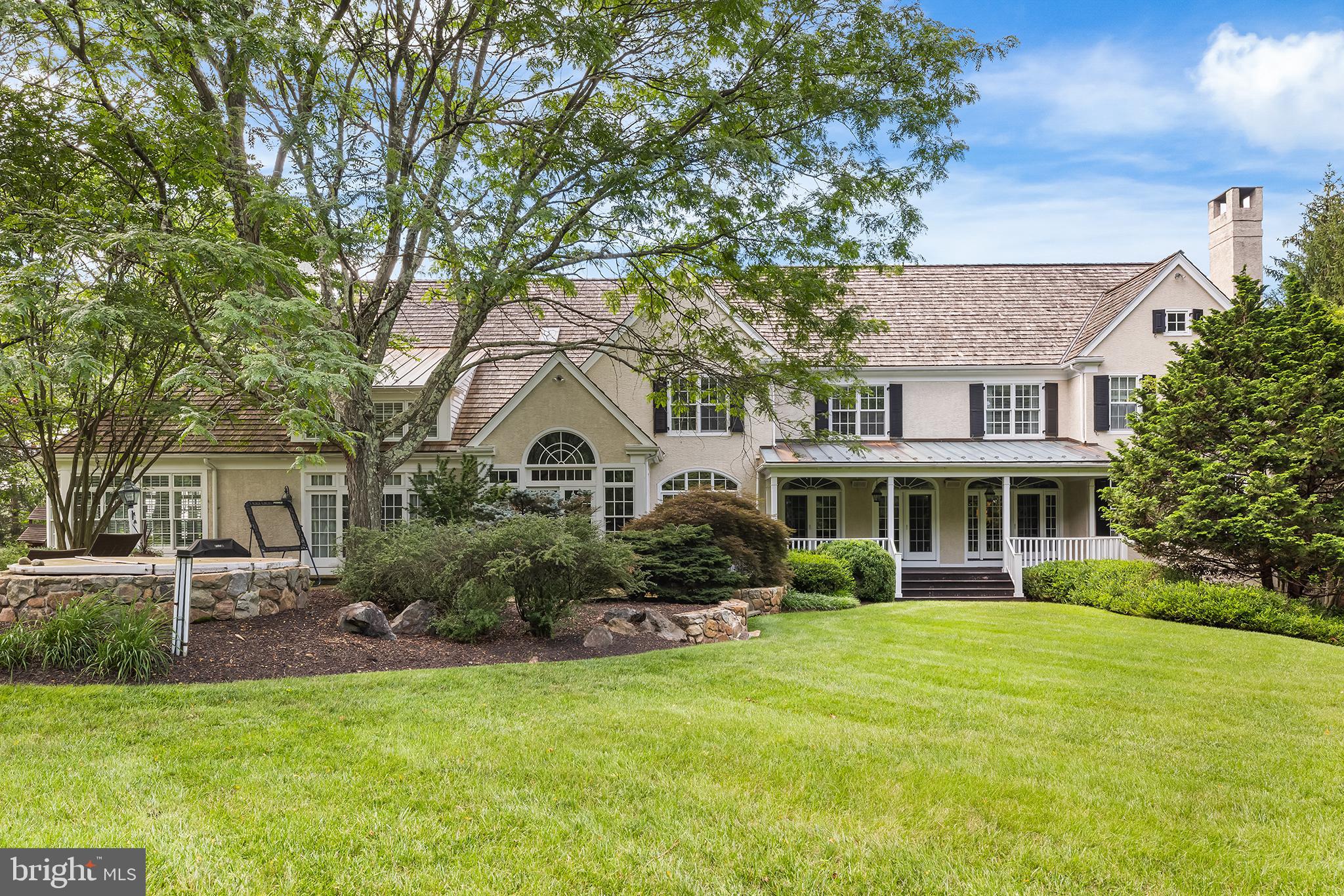 1278 Farm Road Berwyn, PA 19312 - Photo 63 of 65 a front view of a house with garden and trees