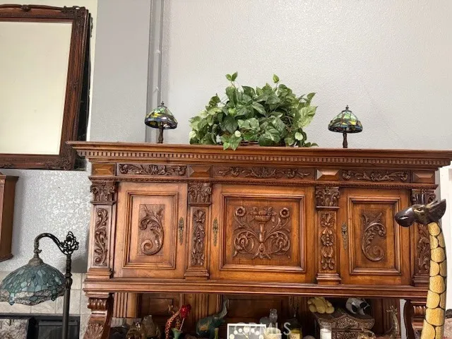 a roof deck with table and chairs
