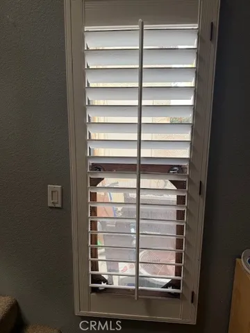 a view of a livingroom with furniture and a fireplace