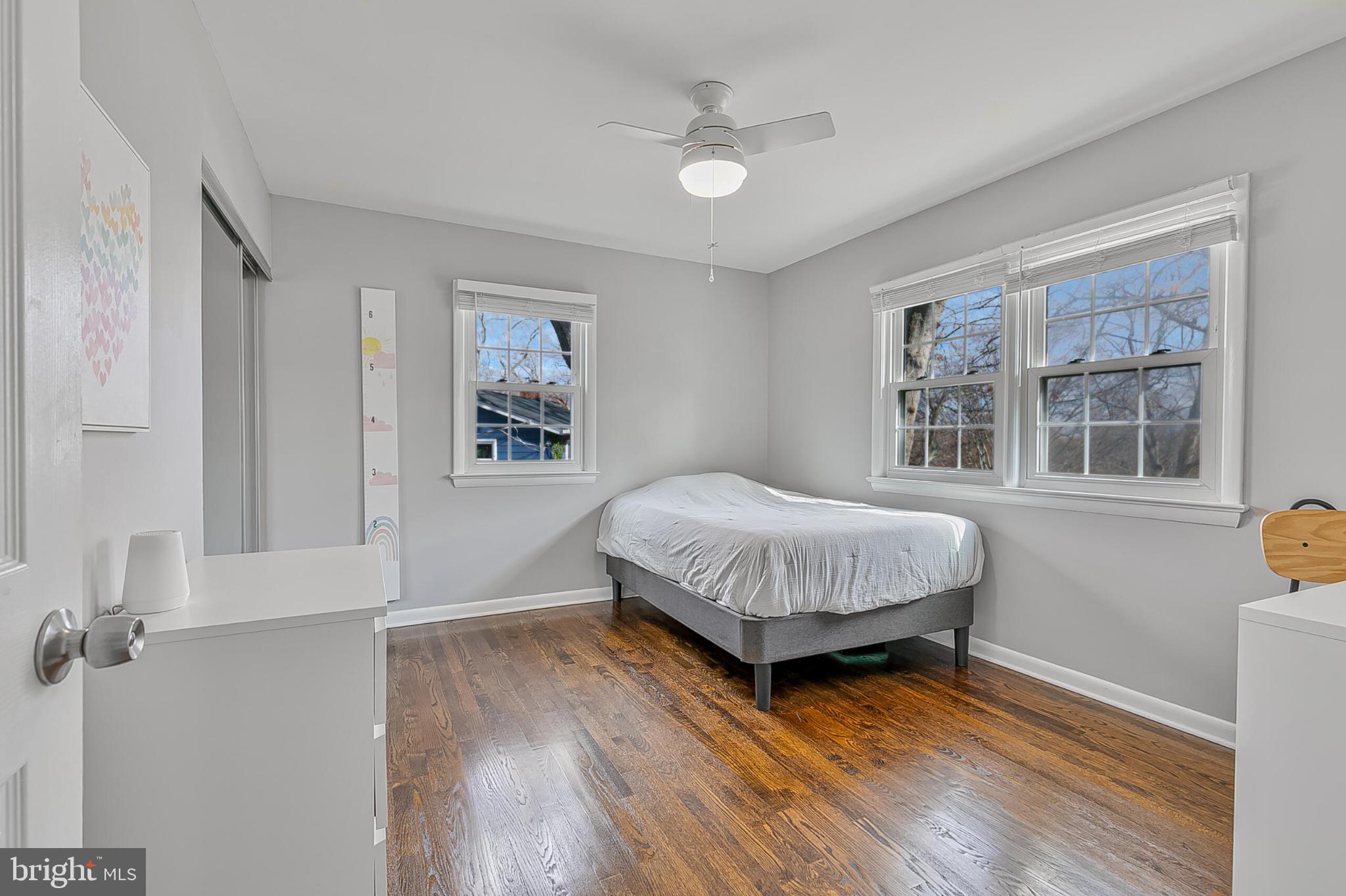 3419 Ramsgate Terrace Alexandria, VA 22309 - Photo 17 of 36 Bright and airy bedroom with hardwood floors.
