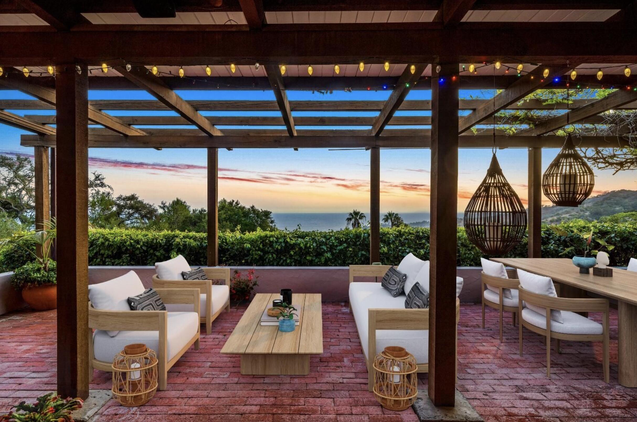 a living room with large windows