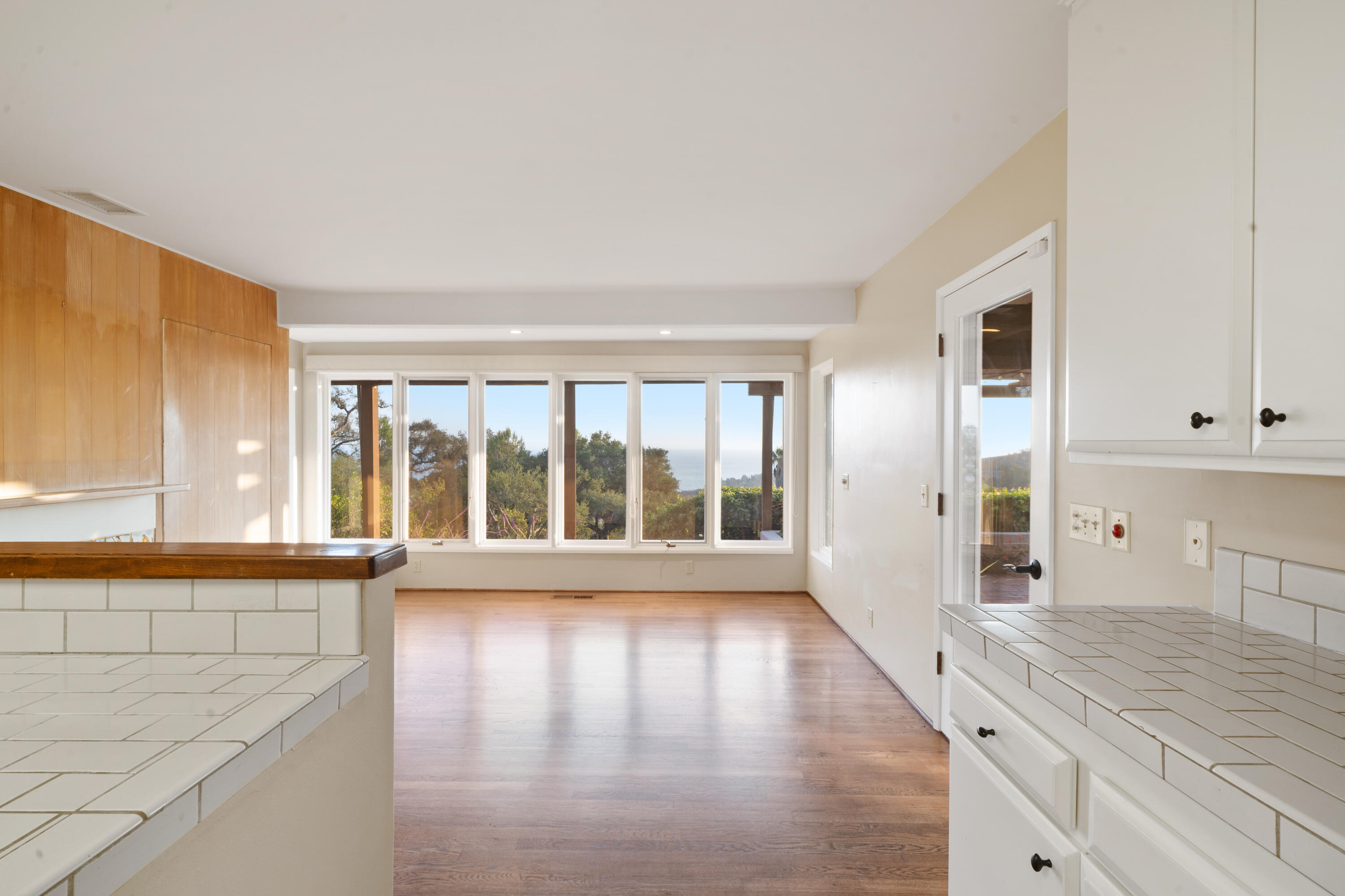 1986 Arriba Street Carpinteria, CA 93013 - Photo 12 of 28 a view of empty room with wooden floor and fan