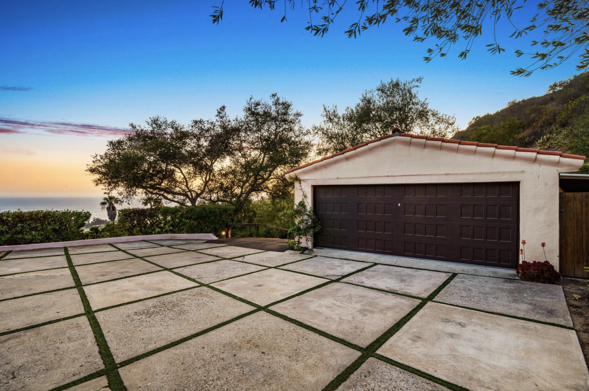 1986 Arriba Street Carpinteria, CA 93013 - Photo 25 of 28 a backyard of a house with plants and a yard