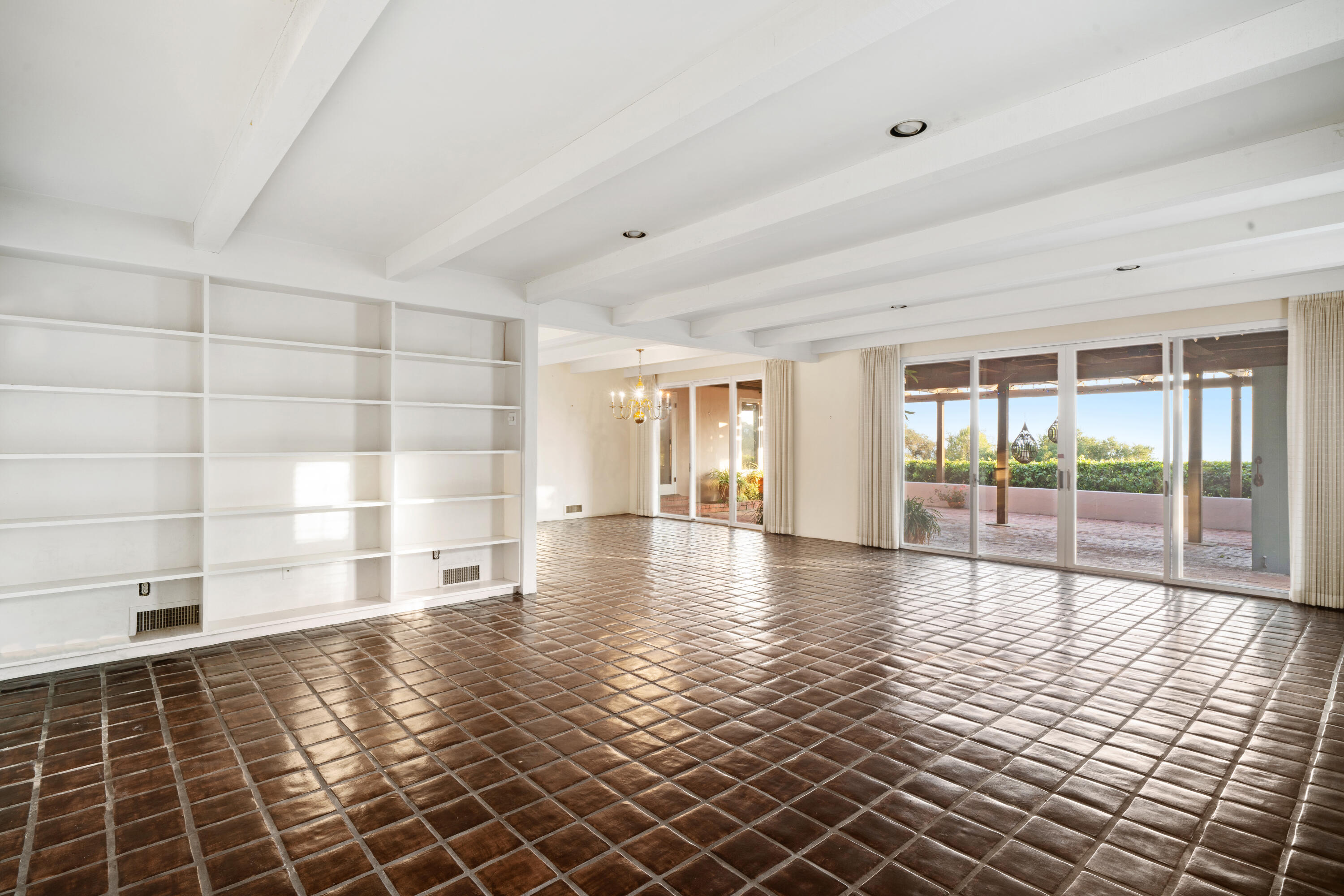 1986 Arriba Street Carpinteria, CA 93013 - Photo 7 of 28 a view of empty room with wooden floor and fan