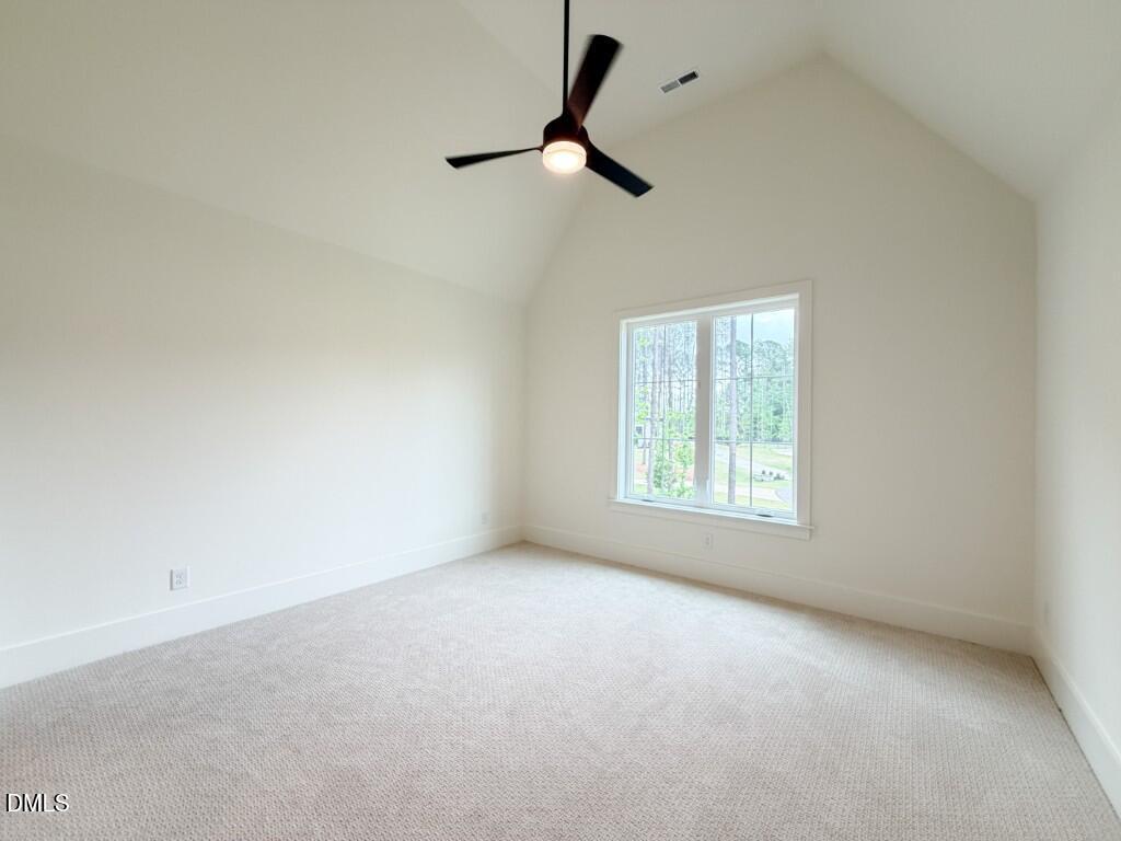 7441 Summer Tanager Trail Raleigh, NC 27614 - Photo 23 of 48 an empty room with a window