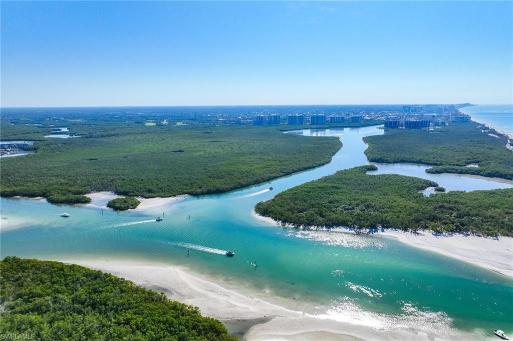 425 Dockside Drive, Unit 905 Naples, FL 34110 - Photo 36 of 50 an aerial view of a golf course with parking space