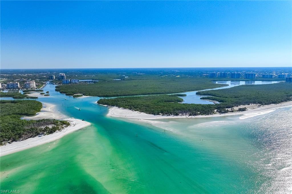 425 Dockside Drive, Unit 905 Naples, FL 34110 - Photo 37 of 50 a view of a field with an ocean