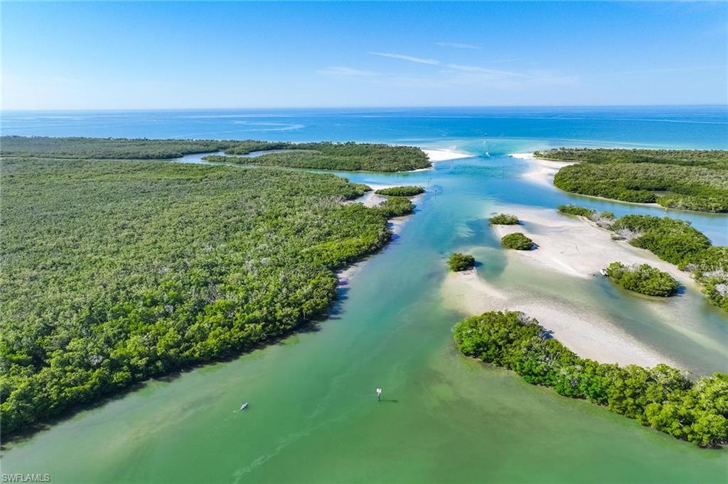 425 Dockside Drive, Unit 905 Naples, FL 34110 - Photo 40 of 50 a view of an ocean and beach