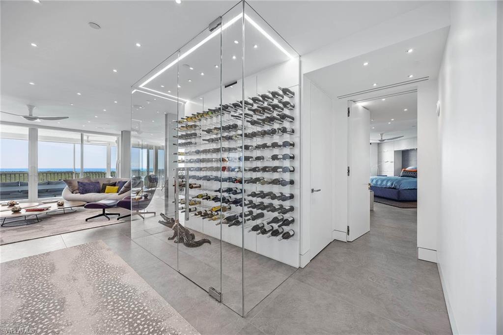 425 Dockside Drive, Unit 905 Naples, FL 34110 - Photo 8 of 50 an entryway and livingroom with furniture