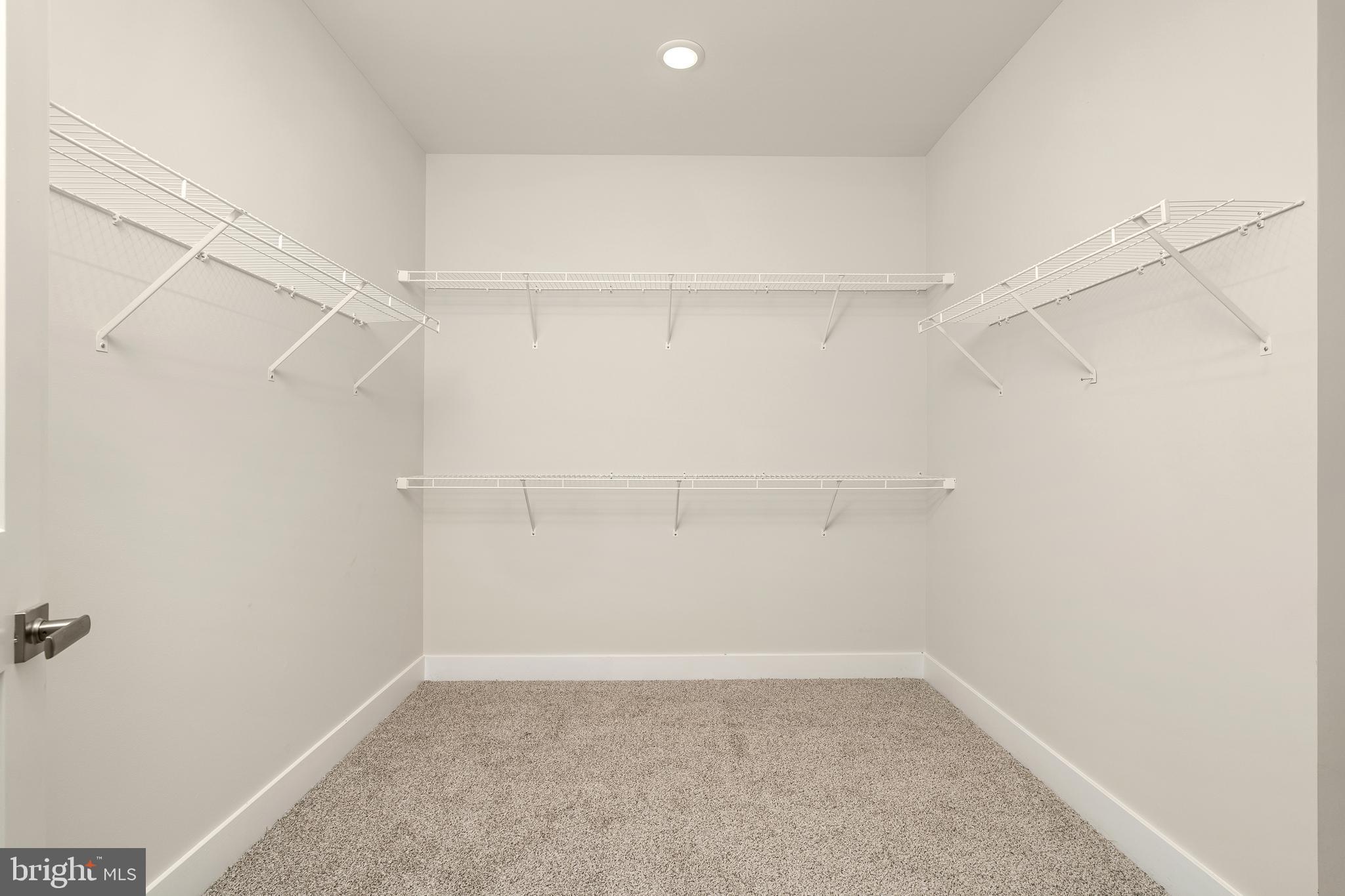 112 Village Drive Skillman, NJ 08558 - Photo 19 of 33 a view of an empty walk in closet