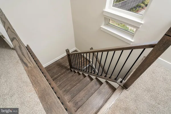 a view of a balcony with stairs