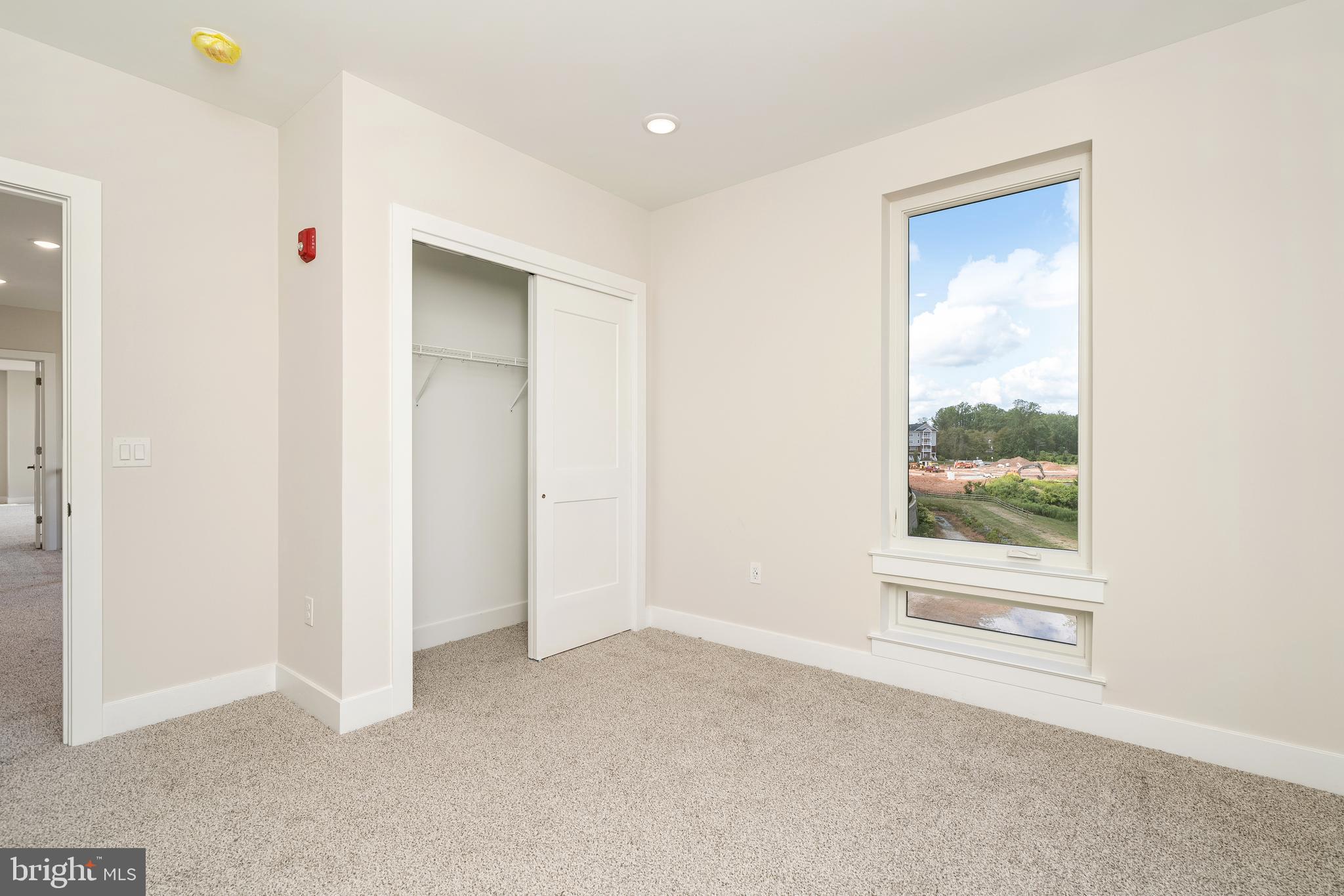 112 Village Drive Skillman, NJ 08558 - Photo 23 of 33 an empty room with a window