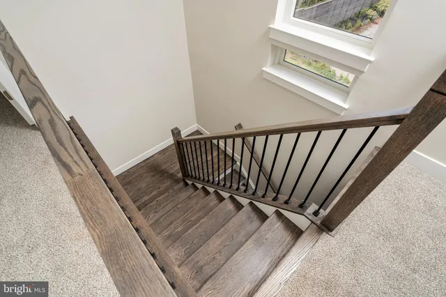a view of a balcony with stairs