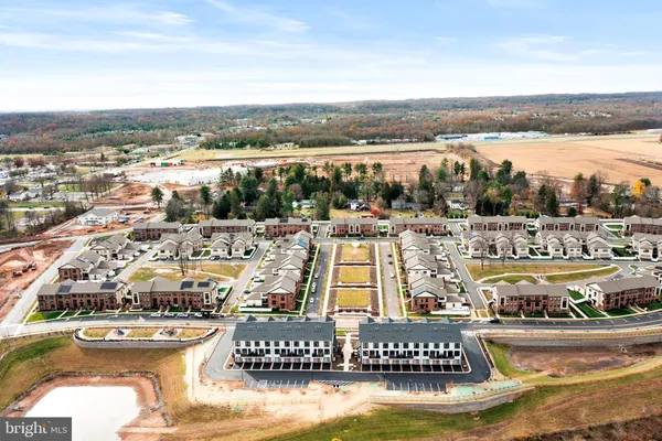 a front view of a house with a swimming pool