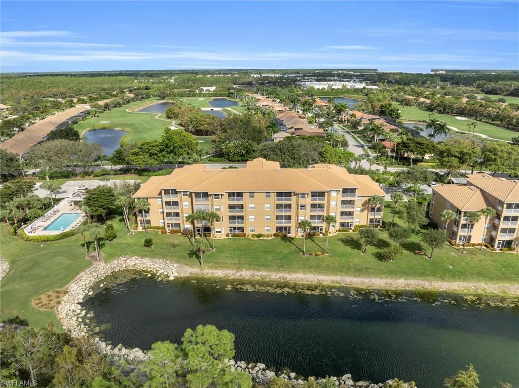 3820 Sawgrass Way, Unit 3043 Naples, FL 34112 - Photo 3 of 44 a view of an ocean and city