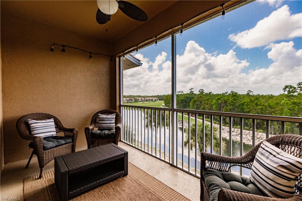 3820 Sawgrass Way, Unit 3043 Naples, FL 34112 - Photo 32 of 44 a balcony view with couple of chairs