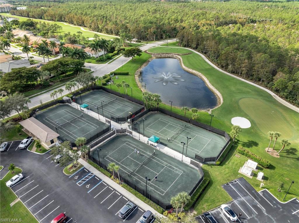3820 Sawgrass Way, Unit 3043 Naples, FL 34112 - Photo 40 of 44 an aerial view of a house with a yard