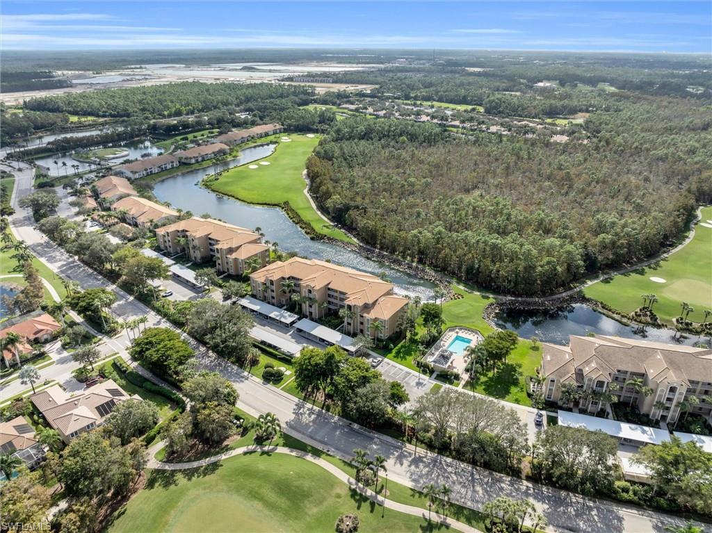 3820 Sawgrass Way, Unit 3043 Naples, FL 34112 - Photo 5 of 44 an aerial view of city and lake