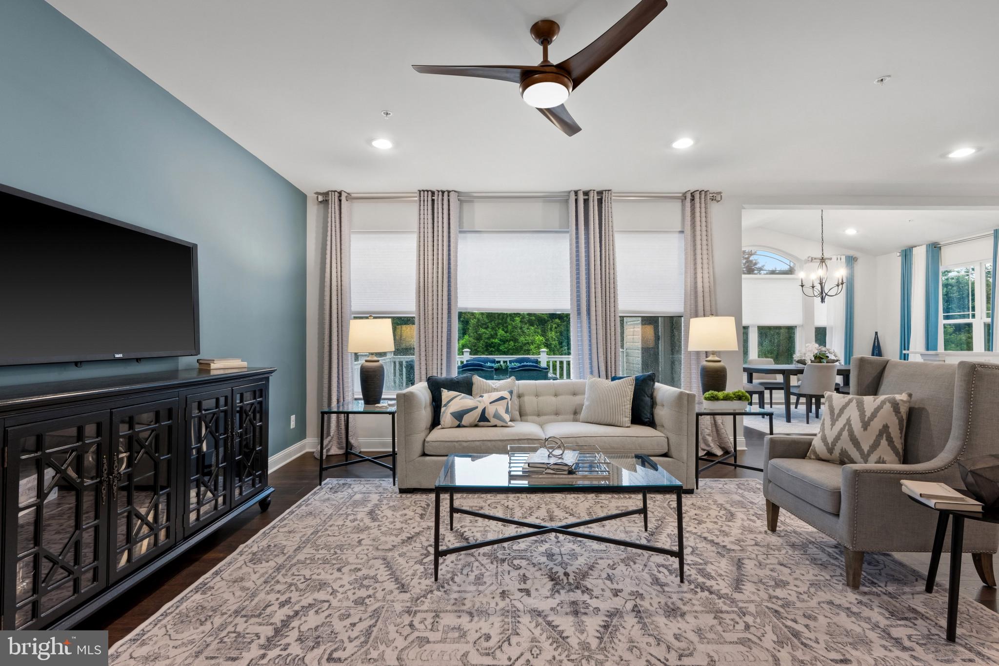 703 Perception Way Aberdeen, MD 21001 - Photo 2 of 42 a living room with furniture and a flat screen tv
