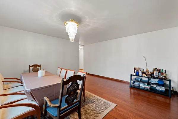 a kitchen with stainless steel appliances a cabinets a sink and a stove