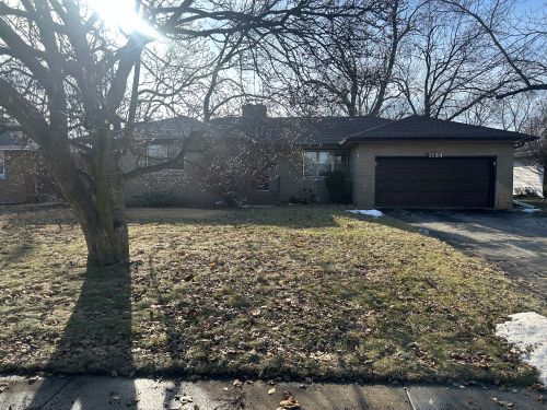 a view of wooden door and outdoor space