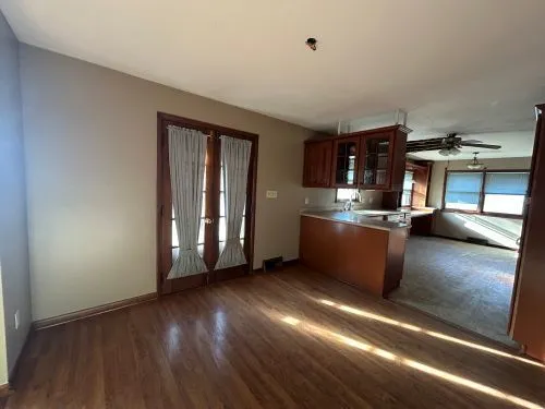 a kitchen with stainless steel appliances granite countertop a stove and a refrigerator