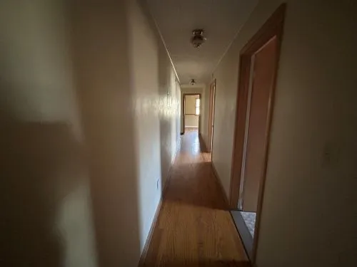 a bathroom with a sink a toilet and a shower