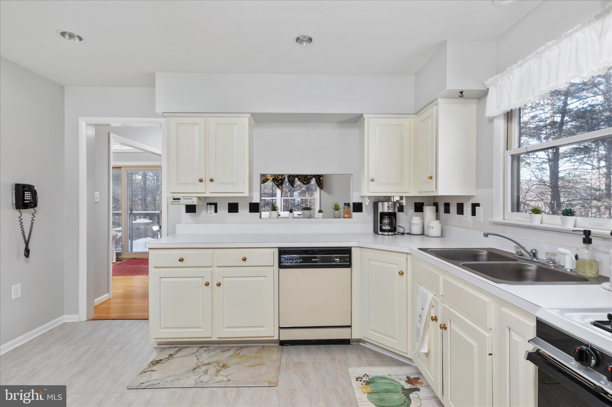 7239 Supinlick Ridge Road Mount Jackson, VA 22842 - Photo 10 of 39 a kitchen with granite countertop white cabinets and white appliances